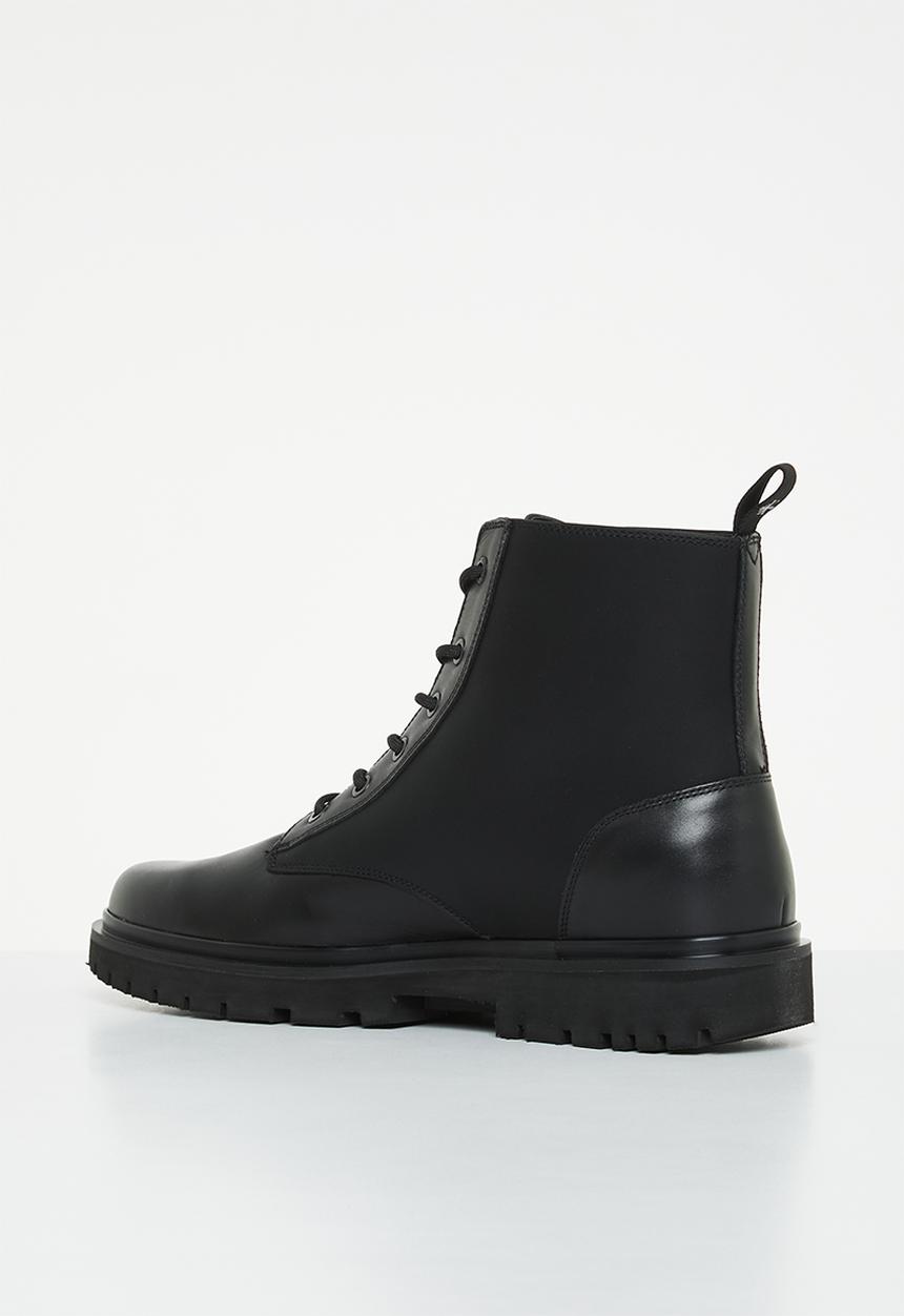 Calvin Klein - Lug lace up leather boot - black