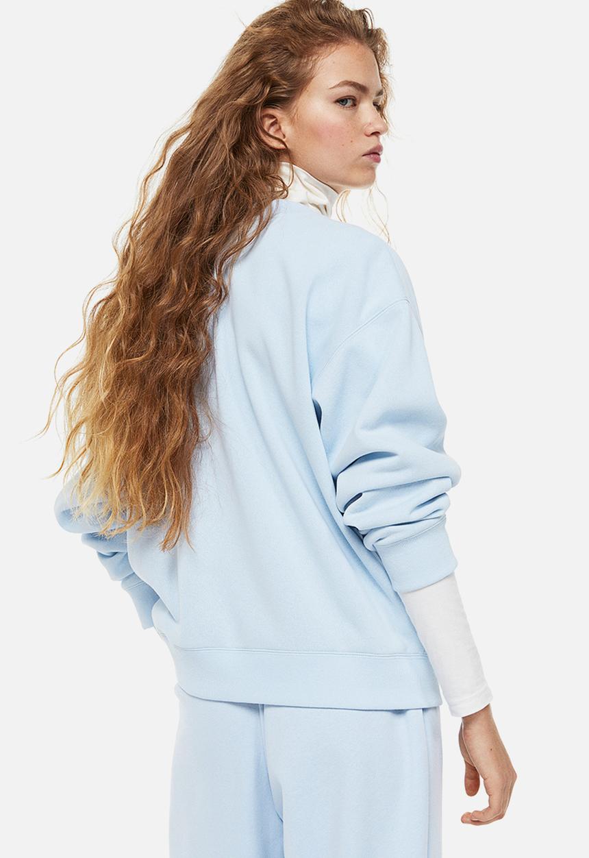 H&M - Printed sweatshirt - light blue/bambi