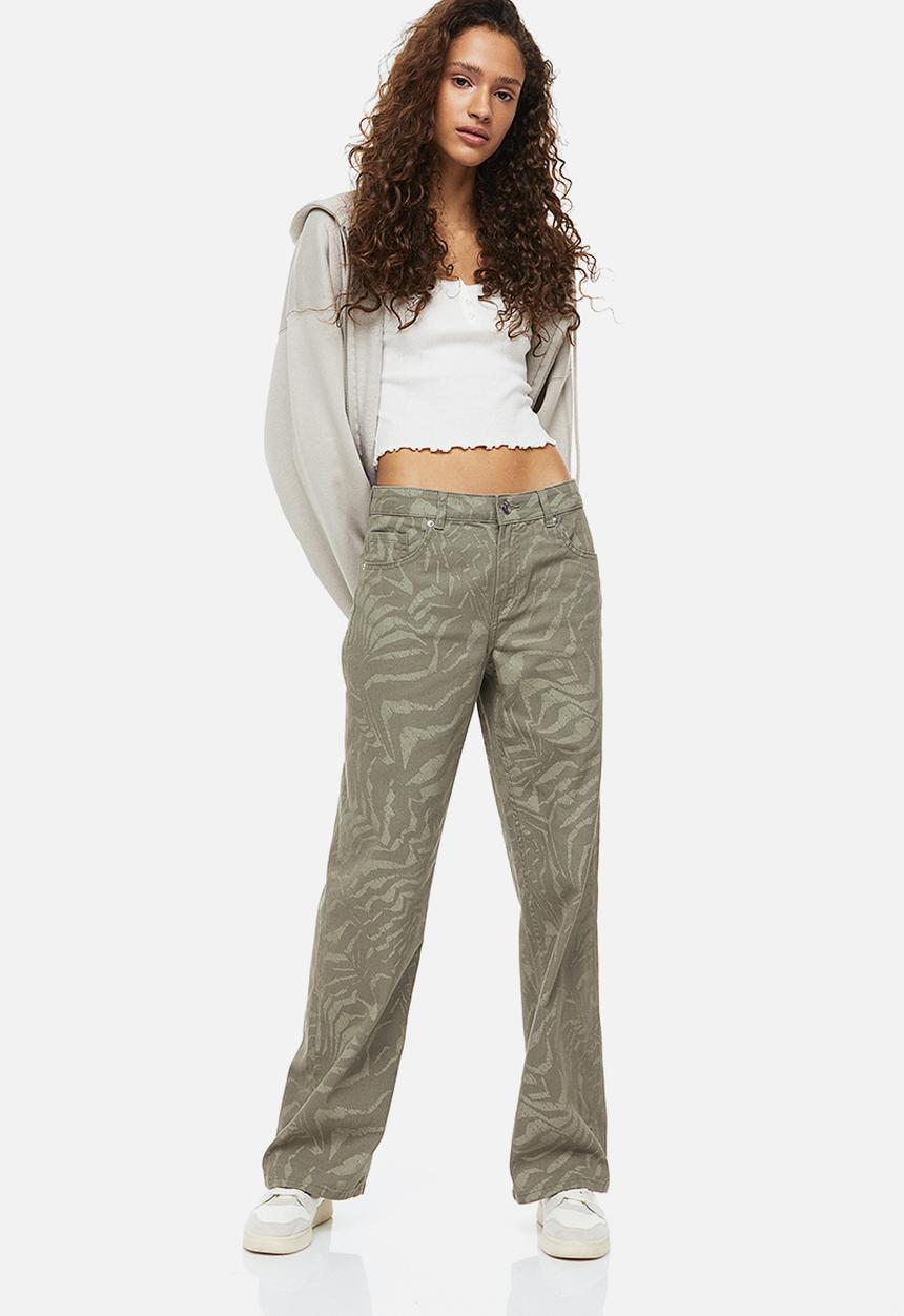 H&M - Wide twill trousers - khaki green/patterned 