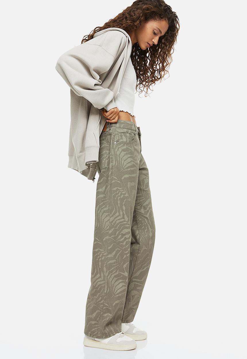 H&M - Wide twill trousers - khaki green/patterned 
