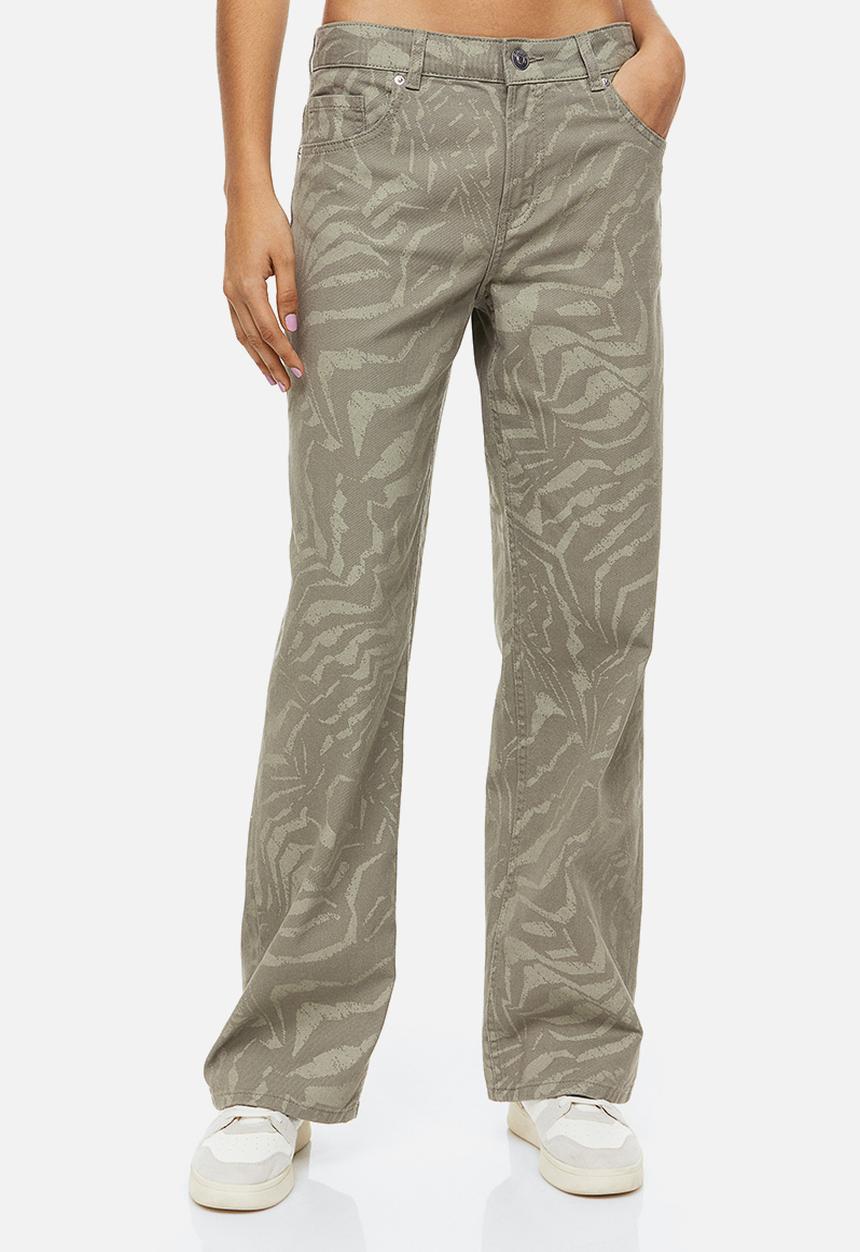 H&M - Wide twill trousers - khaki green/patterned 
