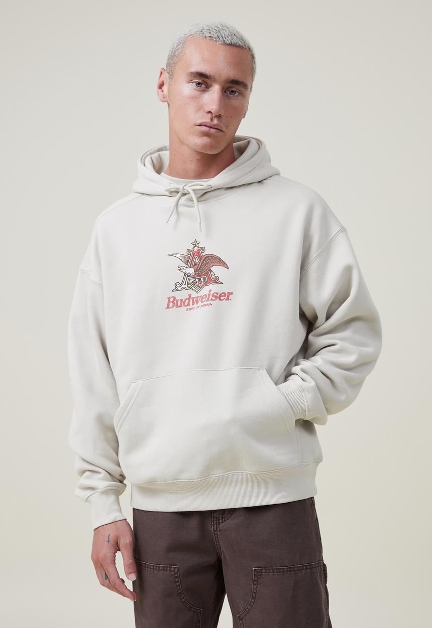 Cotton On - Budweiser oversized fleece hoodie - lcn bud ivory/a & eagle 