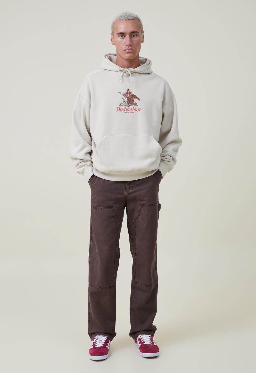 Cotton On - Budweiser oversized fleece hoodie - lcn bud ivory/a & eagle 