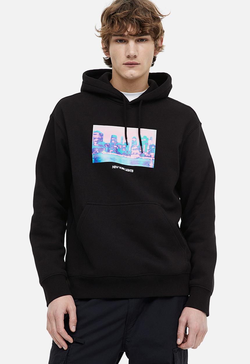 H&M - Relaxed fit printed hoodie - black/new york lights
