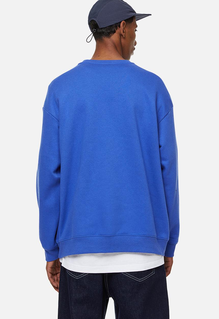 H&M - Relaxed fit sweatshirt - bright blue/graduated