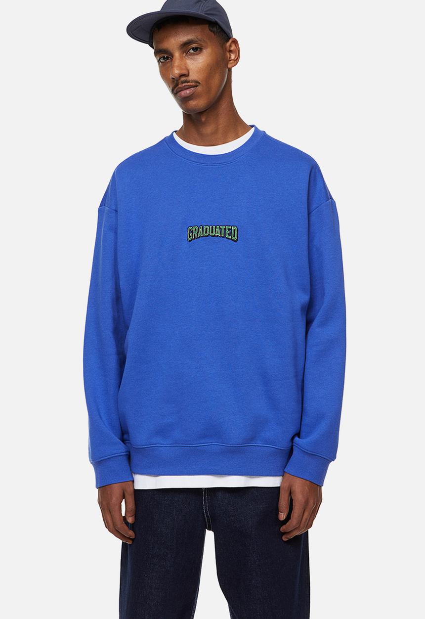 H&M - Relaxed fit sweatshirt - bright blue/graduated