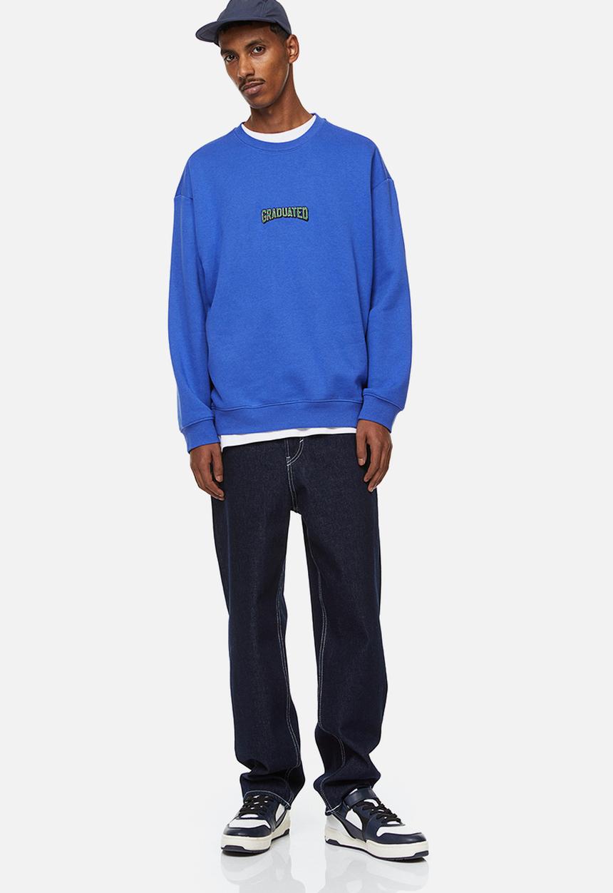 H&M - Relaxed fit sweatshirt - bright blue/graduated