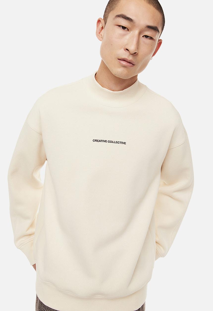 H&M - Relaxed fit sweatshirt - cream/creative collective
