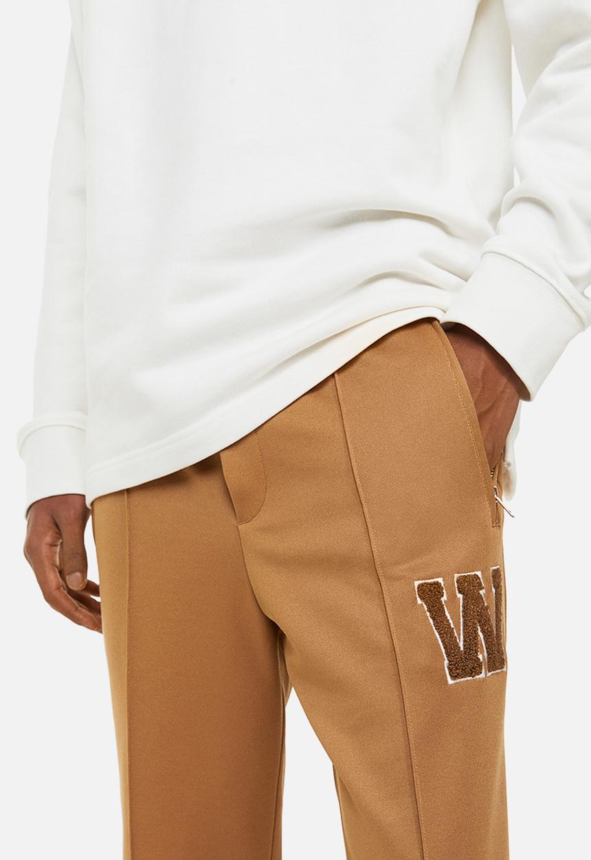 H&M - Regular fit dressy joggers - dark beige/w