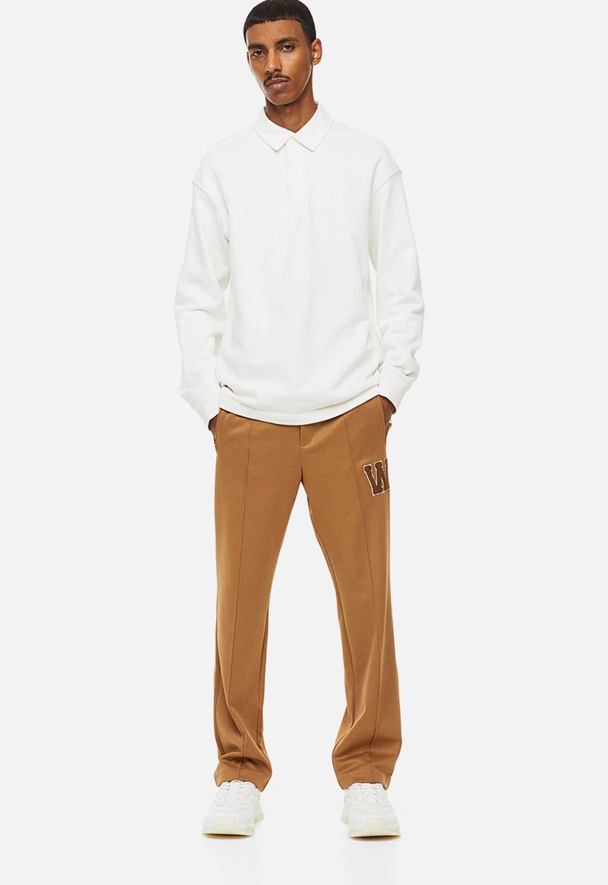 H&M - Regular fit dressy joggers - dark beige/w