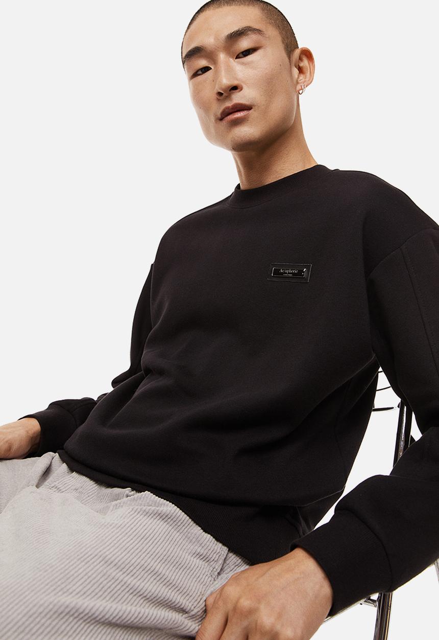 H&M - Relaxed fit appliquéd sweatshirt - black