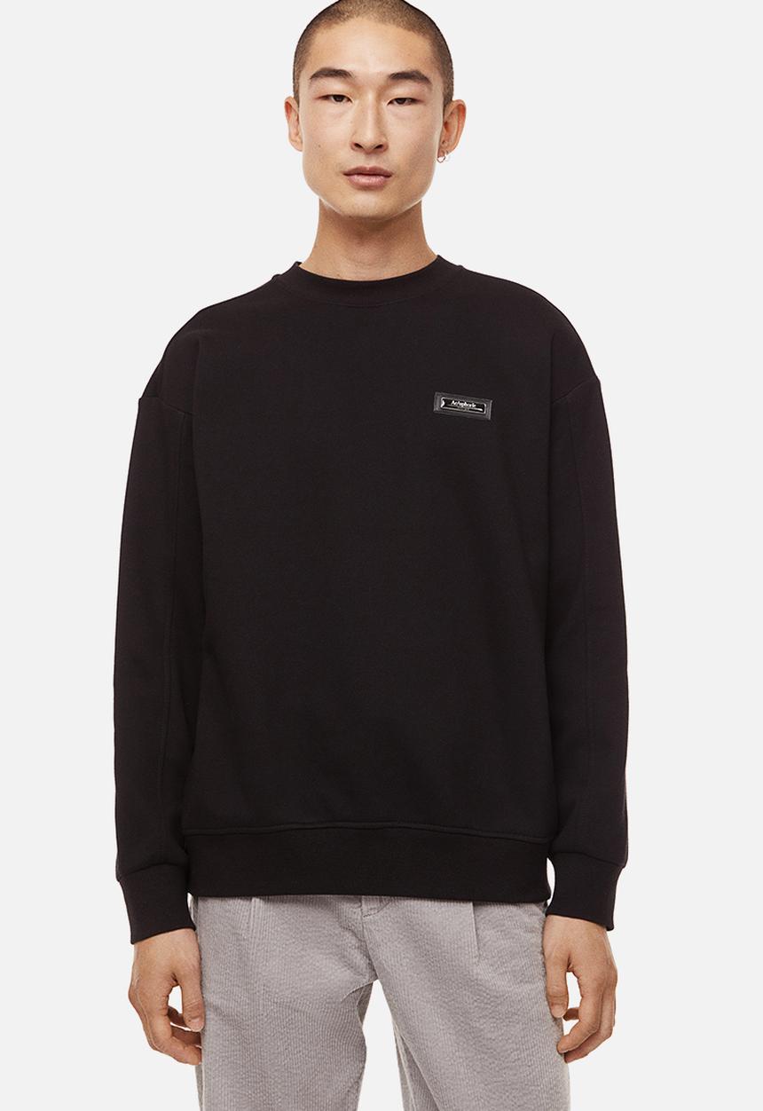 H&M - Relaxed fit appliquéd sweatshirt - black