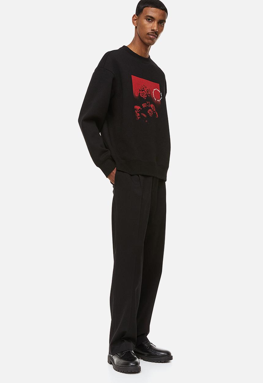 H&M - Relaxed fit printed sweatshirt - black/roses