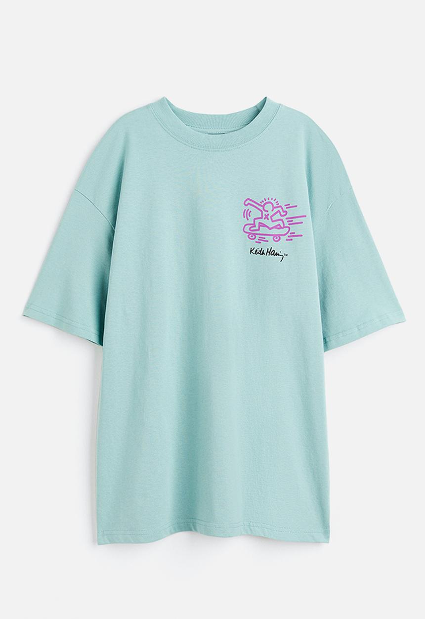 H&M - Keith Haring x H&M: Oversized printed t-shirt - light turquoise