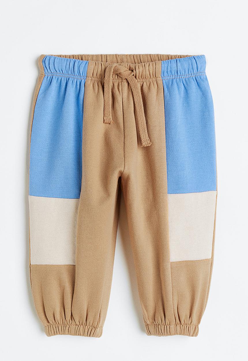 H&M - Cotton joggers - light beige block-coloured 