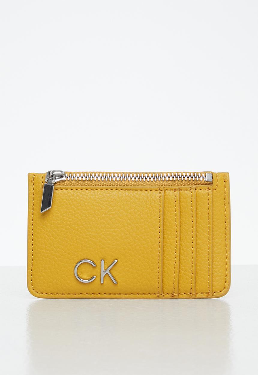 Calvin Klein - Re-lock cardholder w/zip pbl - monarch gold