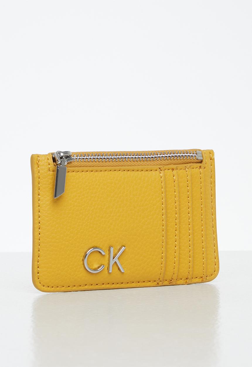 Calvin Klein - Re-lock cardholder w/zip pbl - monarch gold