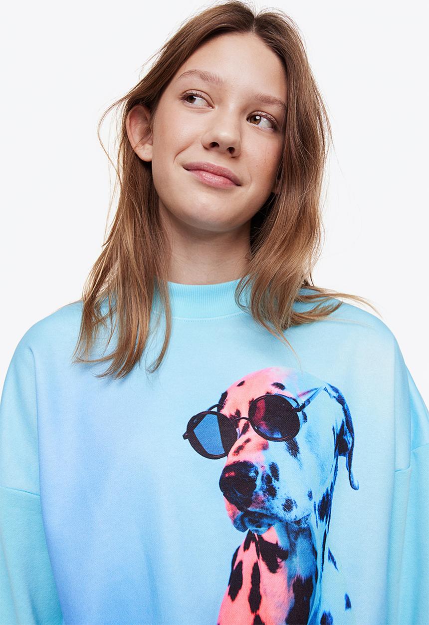H&M - Boxy sweatshirt - light turquoise/dalmatian