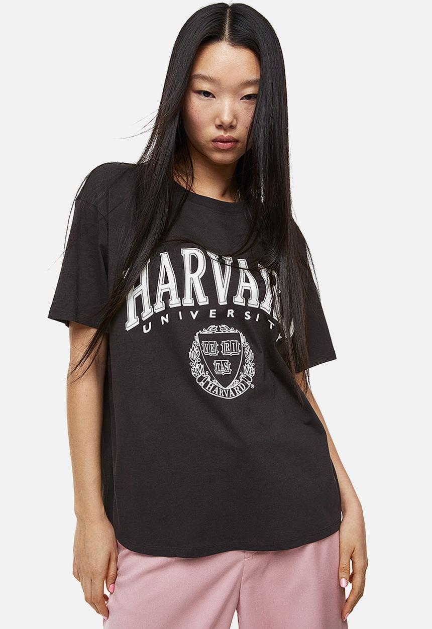 H&M - Oversized printed t-shirt - black/harvard