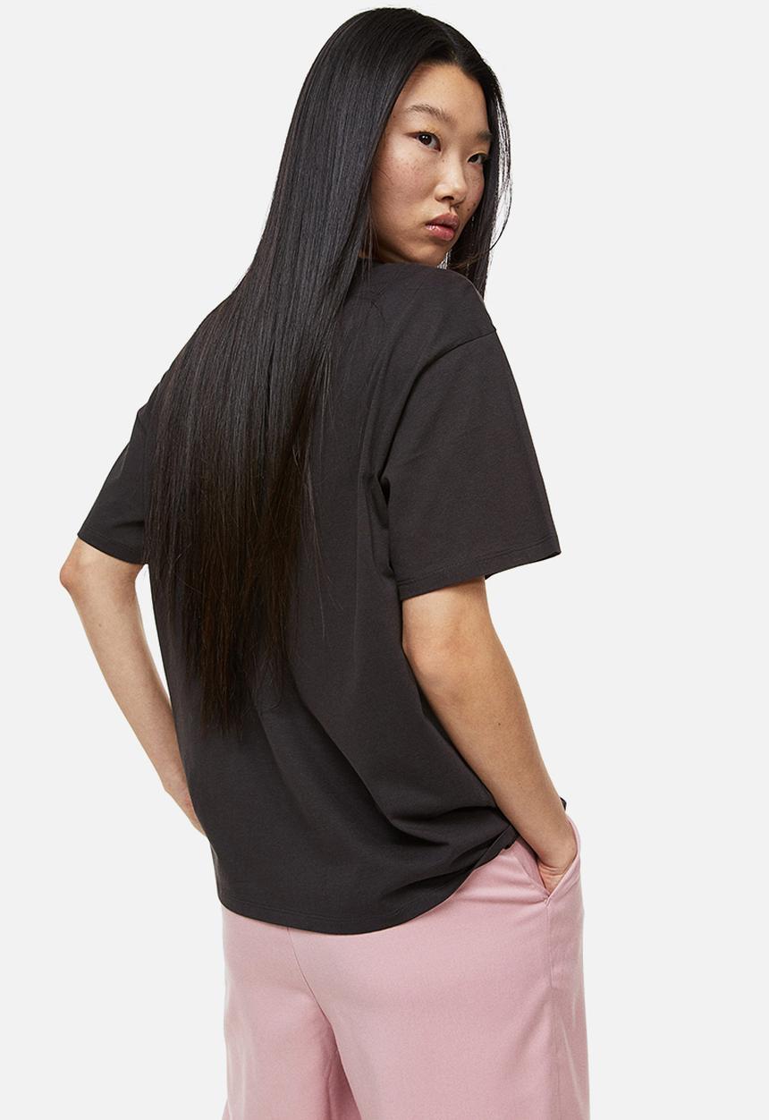 H&M - Oversized printed t-shirt - black/harvard