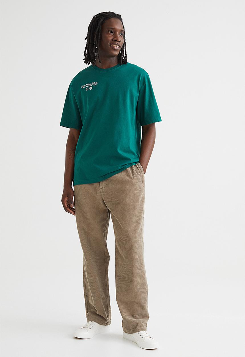 H&M - Relaxed fit printed t-shirt - dark green/never waste talent 