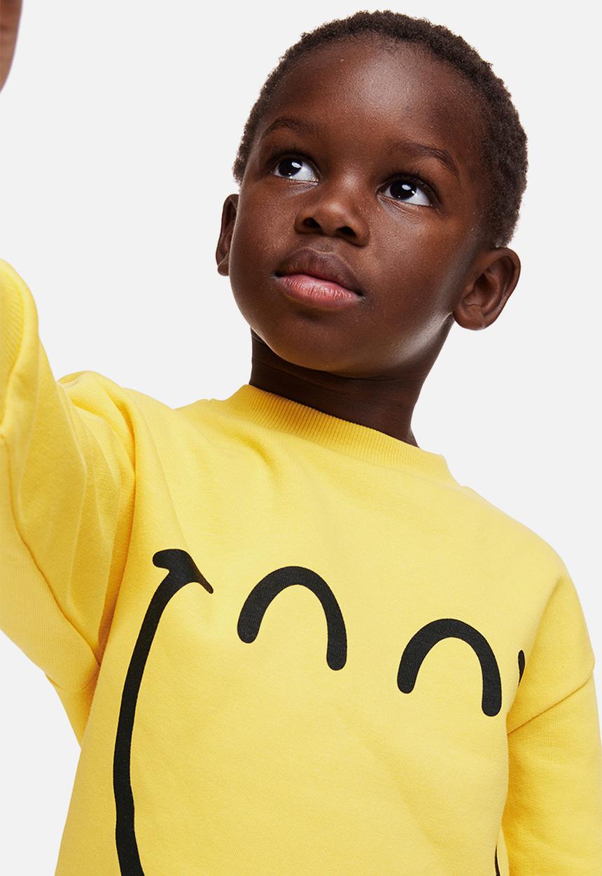 H&M - Printed sweatshirt - yellow smileyworld® 