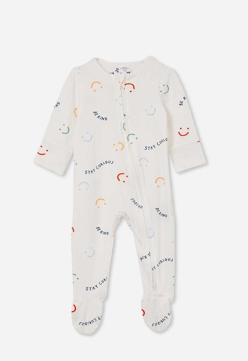 Cotton On - The long sleeve zip romper - vanilla / curious & kind
