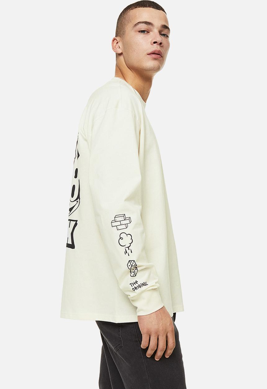 H&M - Relaxed fit printed jersey top - cream/felix the cat