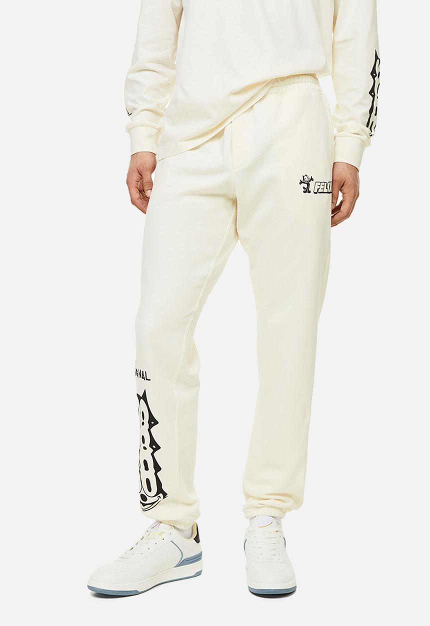 H&M - Regular fit sweatpants - cream/felix the cat 