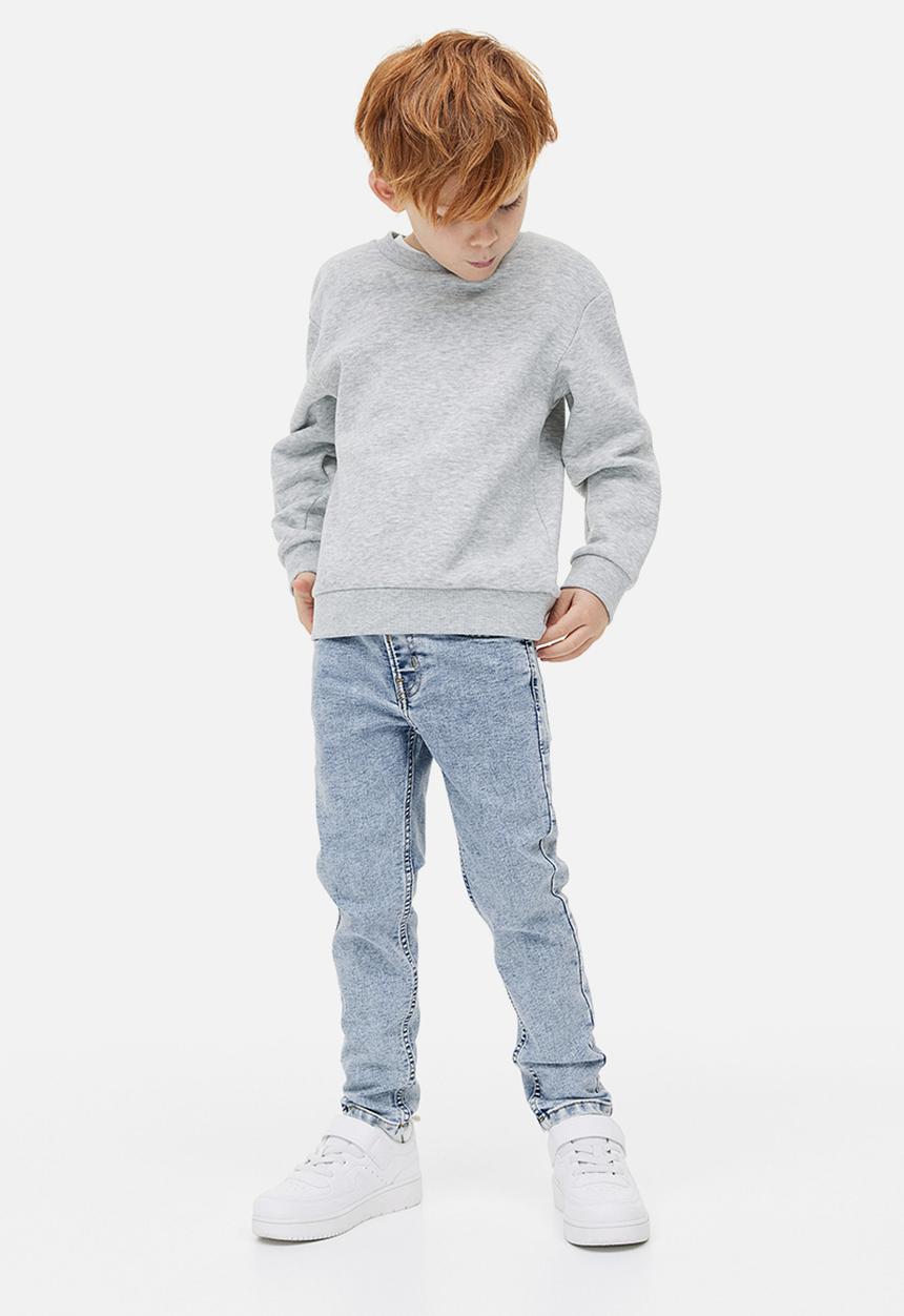 H&M - Relaxed tapered fit jeans - light denim blue 