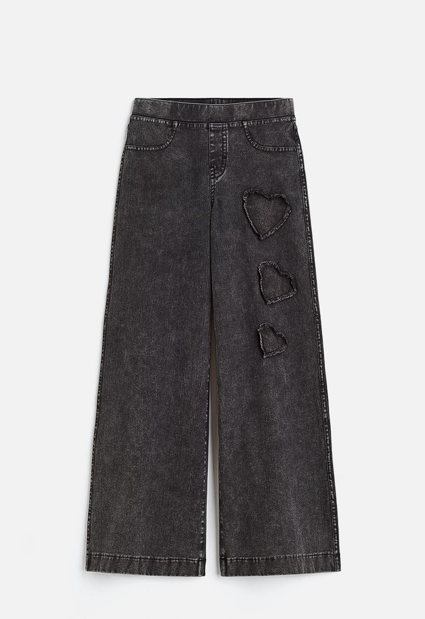 H&M - Wide trousers - black/hearts 