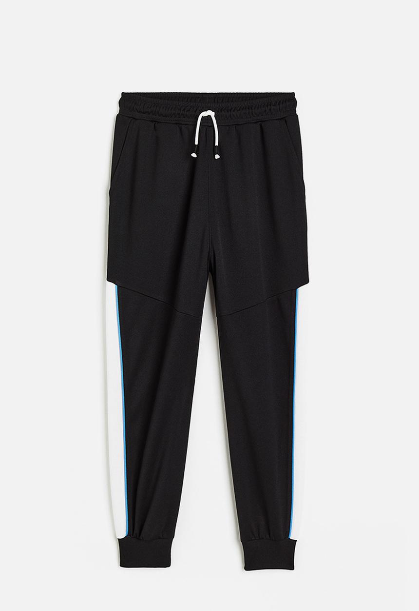 H&M - Track pants - black/block-coloured 