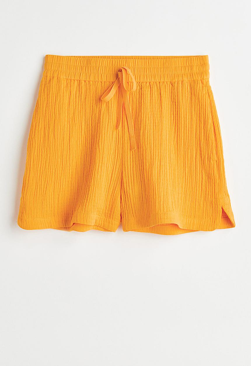 H&M - Crinkled cotton shorts - dark yellow 