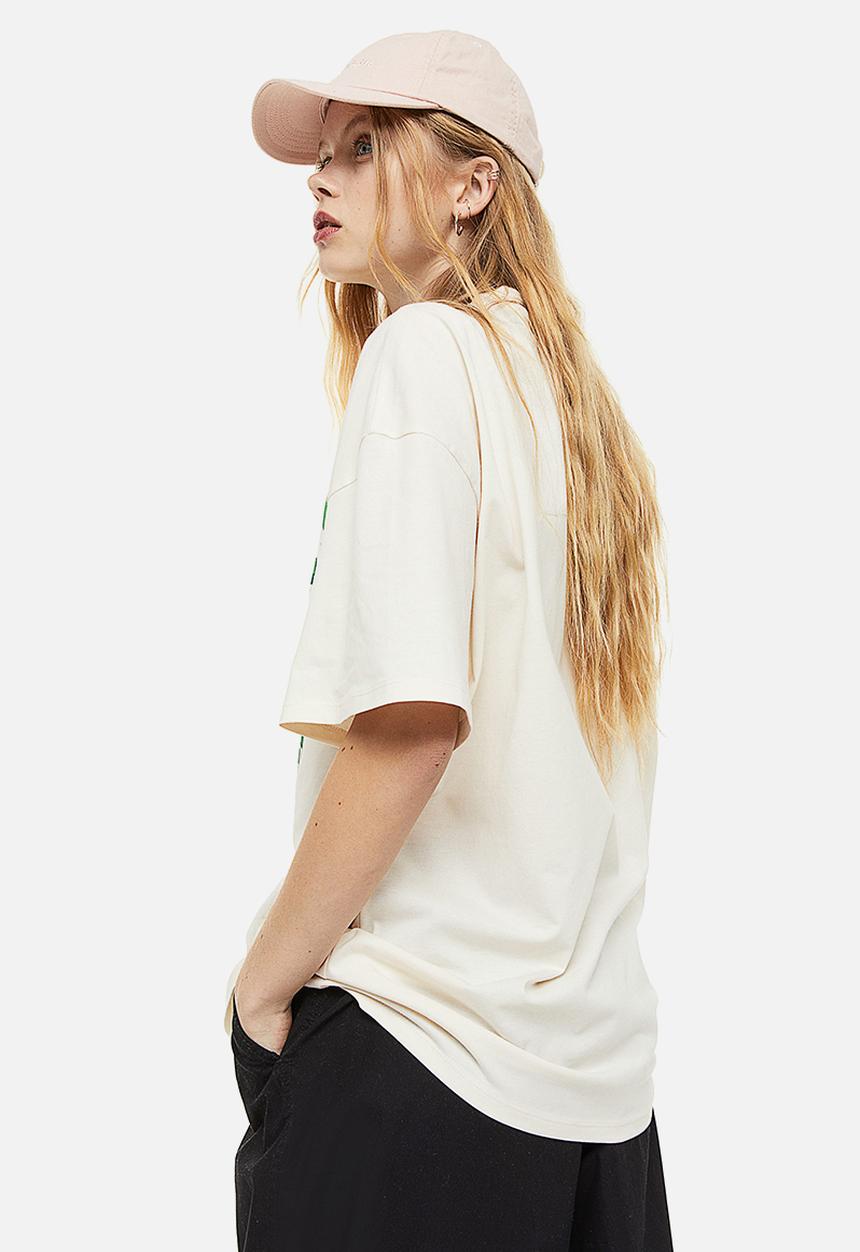 H&M - Oversized printed T-shirt - cream/cannes 