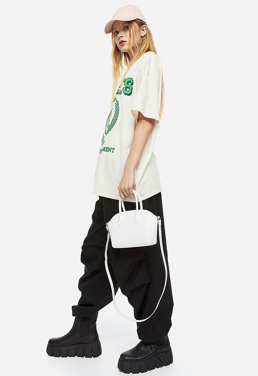 H&M - Oversized printed T-shirt - cream/cannes 