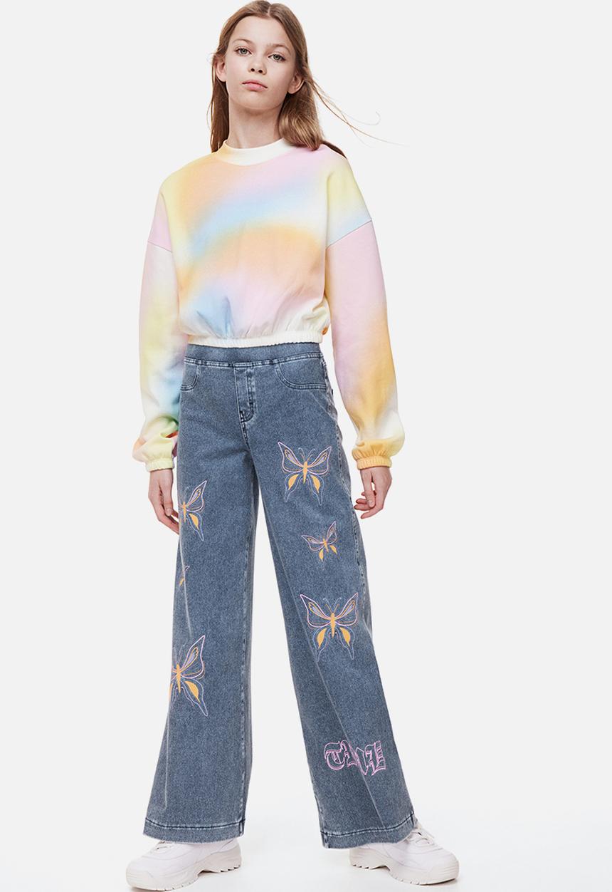 H&M - Wide trousers - denim blue/butterflies 