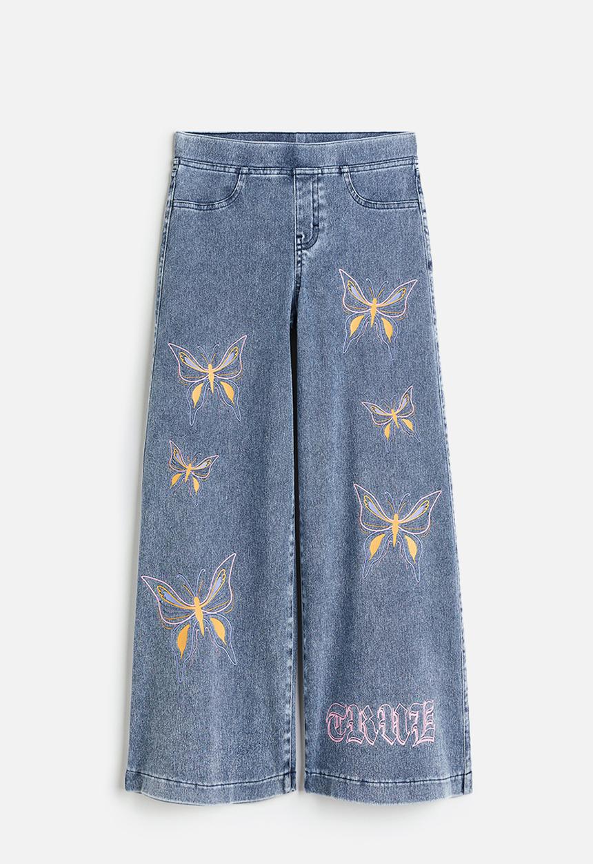 H&M - Wide trousers - denim blue/butterflies 
