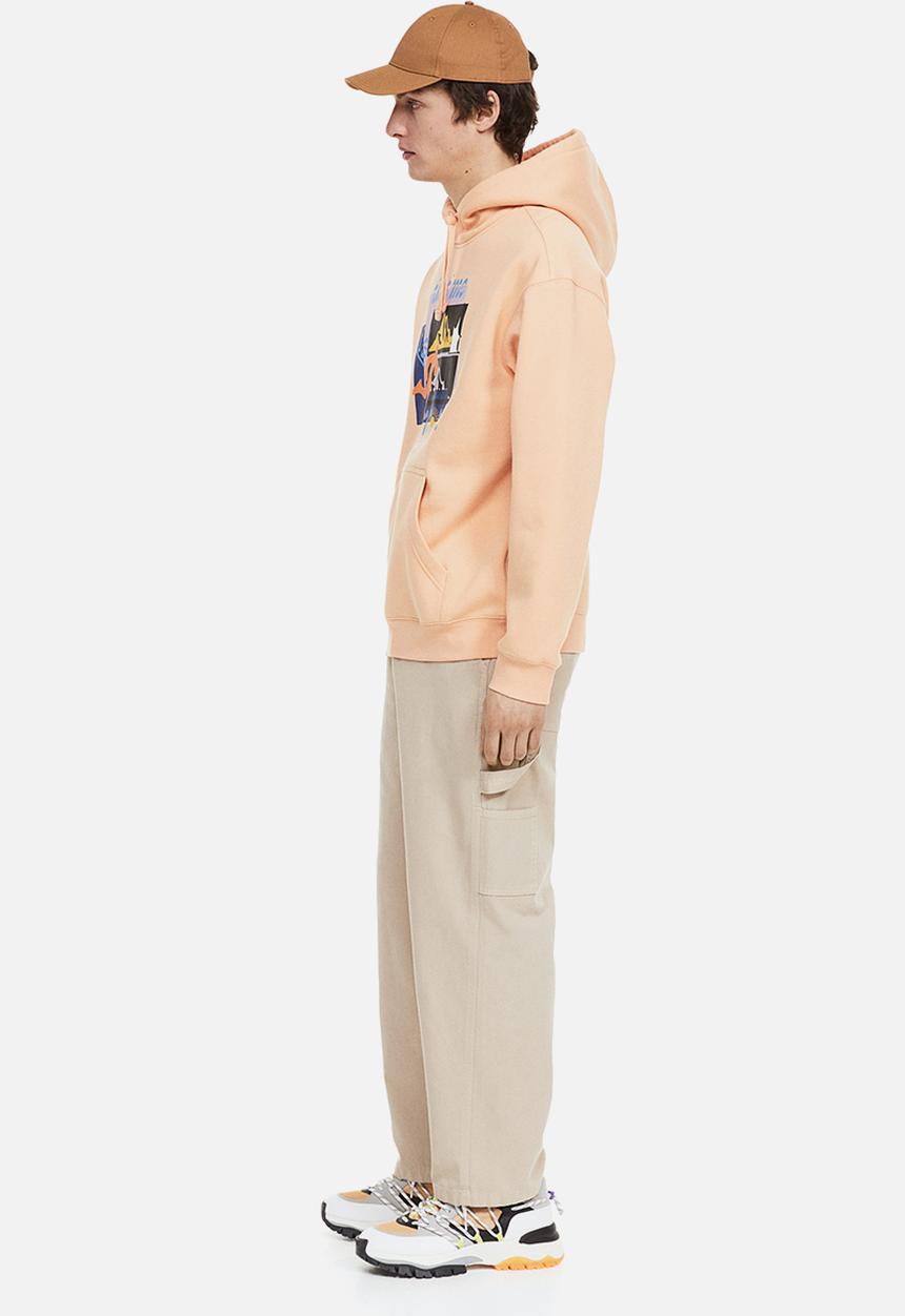 H&M - Relaxed fit printed hoodie - apricot/the time is now
