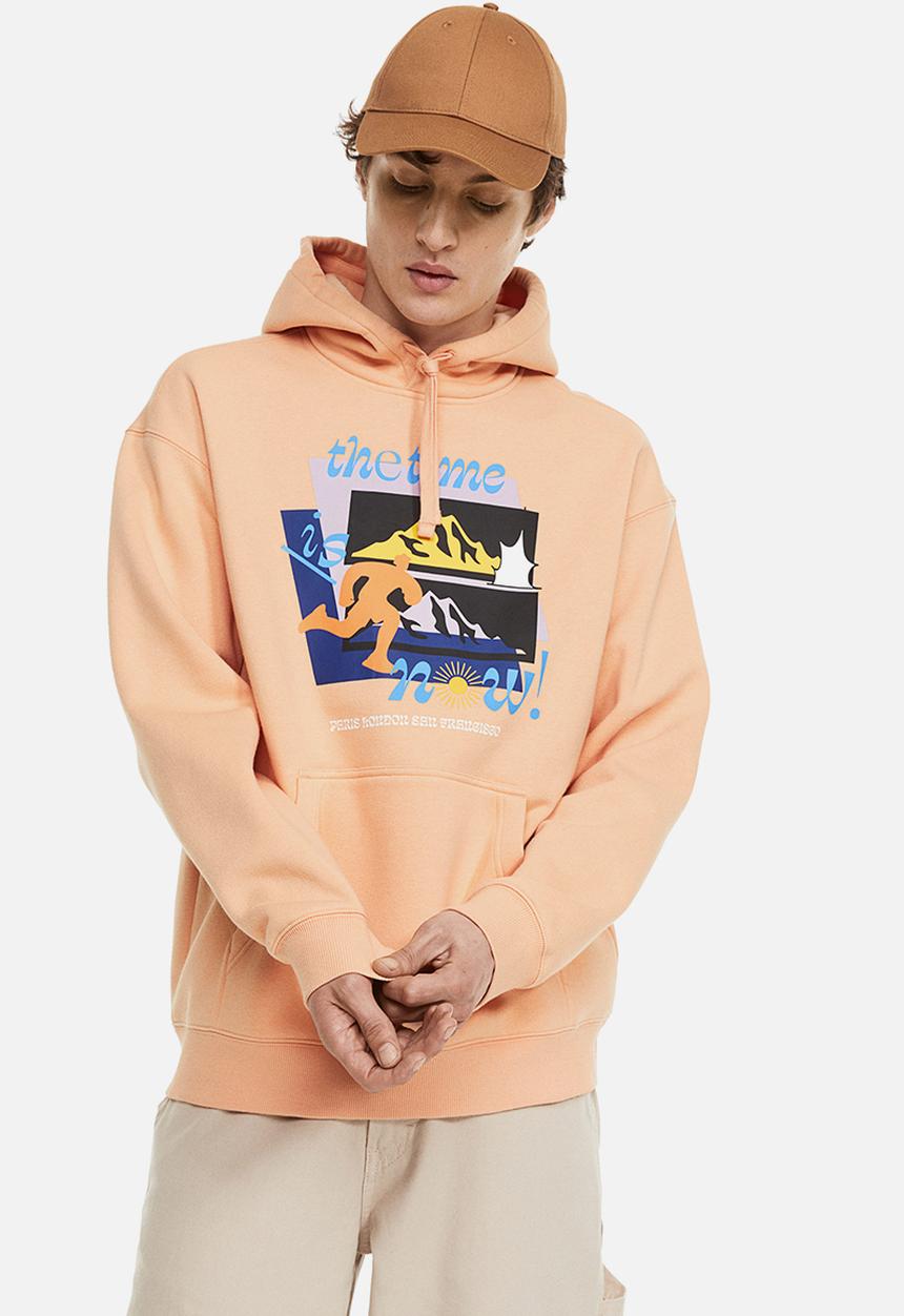 H&M - Relaxed fit printed hoodie - apricot/the time is now