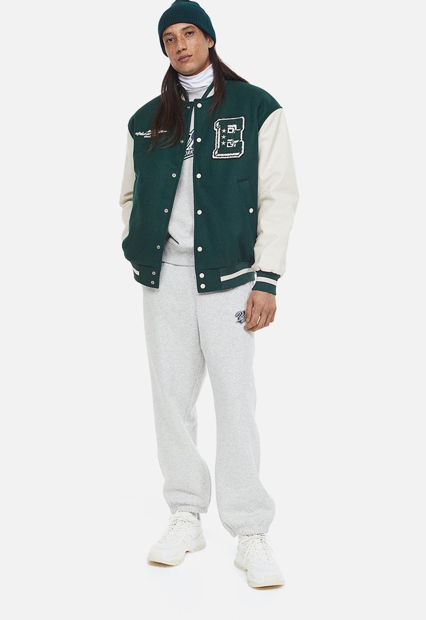 H&M - Loose fit printed sweatpants - light grey marl/varsity