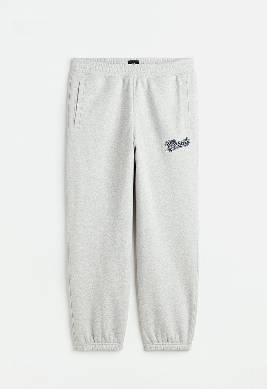 H&M - Loose fit printed sweatpants - light grey marl/varsity