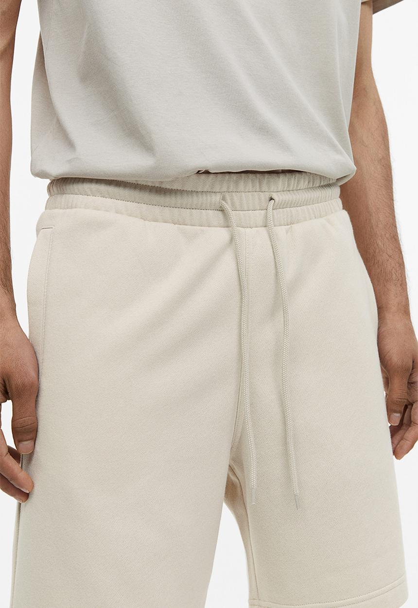 H&M - Regular fit sweatshorts - light beige