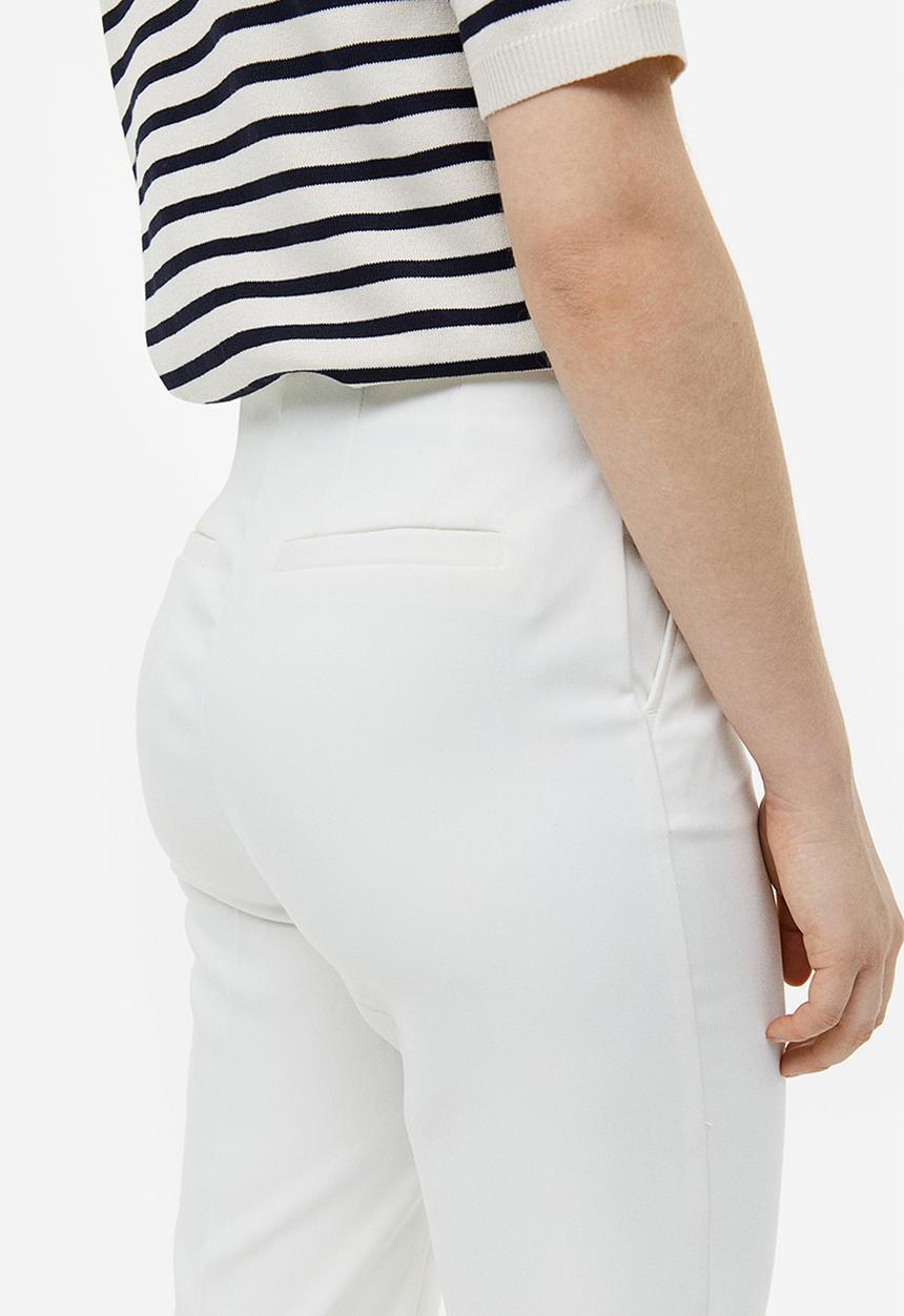 H&M - Tapered trousers - cream 