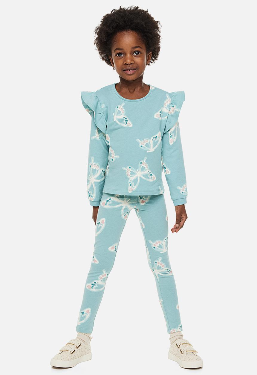 H&M - Leggings - light turquoise / butterflies 