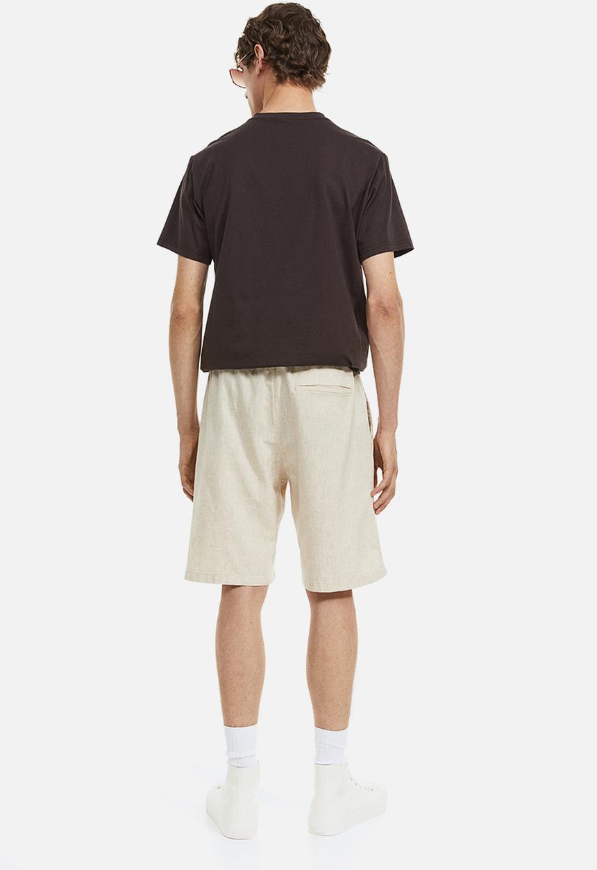 H&M - Regular fit shorts - light beige 