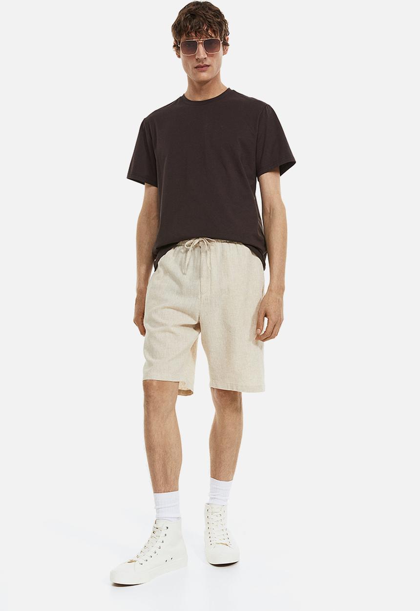 H&M - Regular fit shorts - light beige 