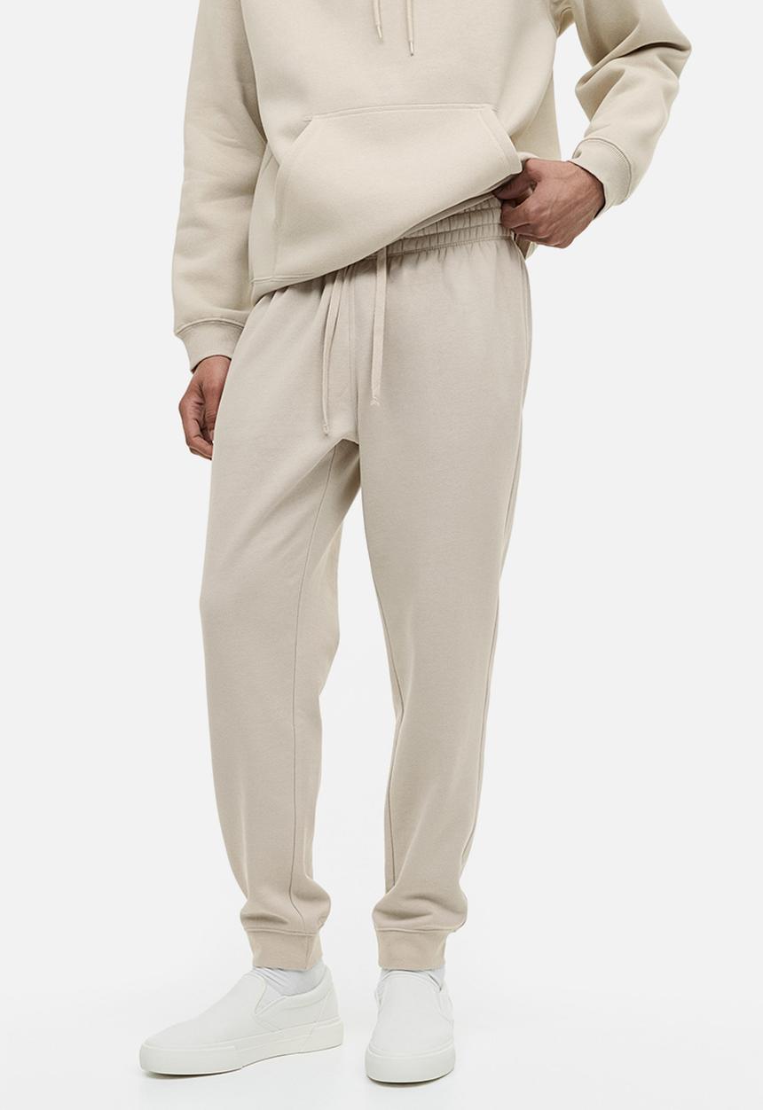 H&M - Regular fit sweatpants - cream 