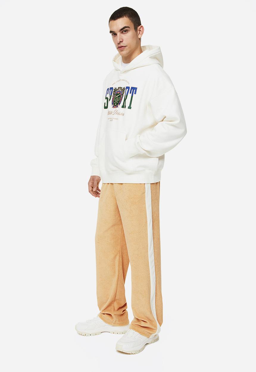H&M - Relaxed fit terry track pants - beige