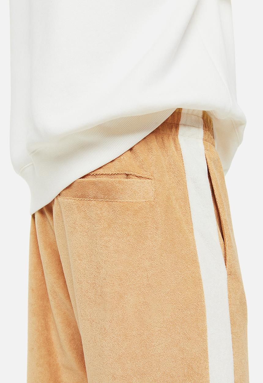 H&M - Relaxed fit terry track pants - beige