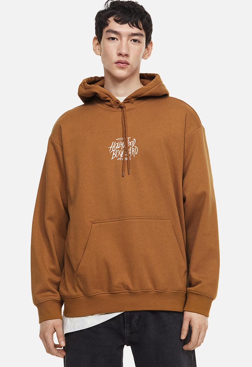 H&M - Relaxed fit printed hoodie - brown / hollywood 